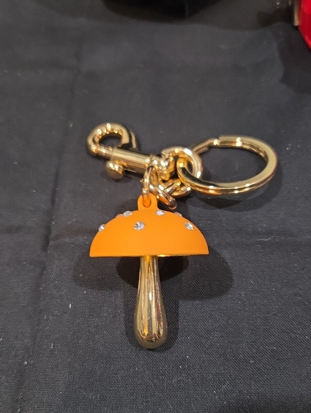 ORANGE AND RHINESTONE MUSHROOM PURSE CHARM